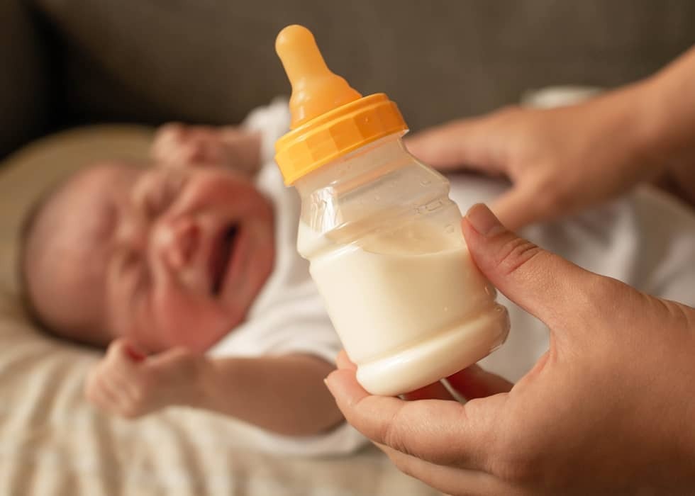 Huilende baby door koemelkallergie